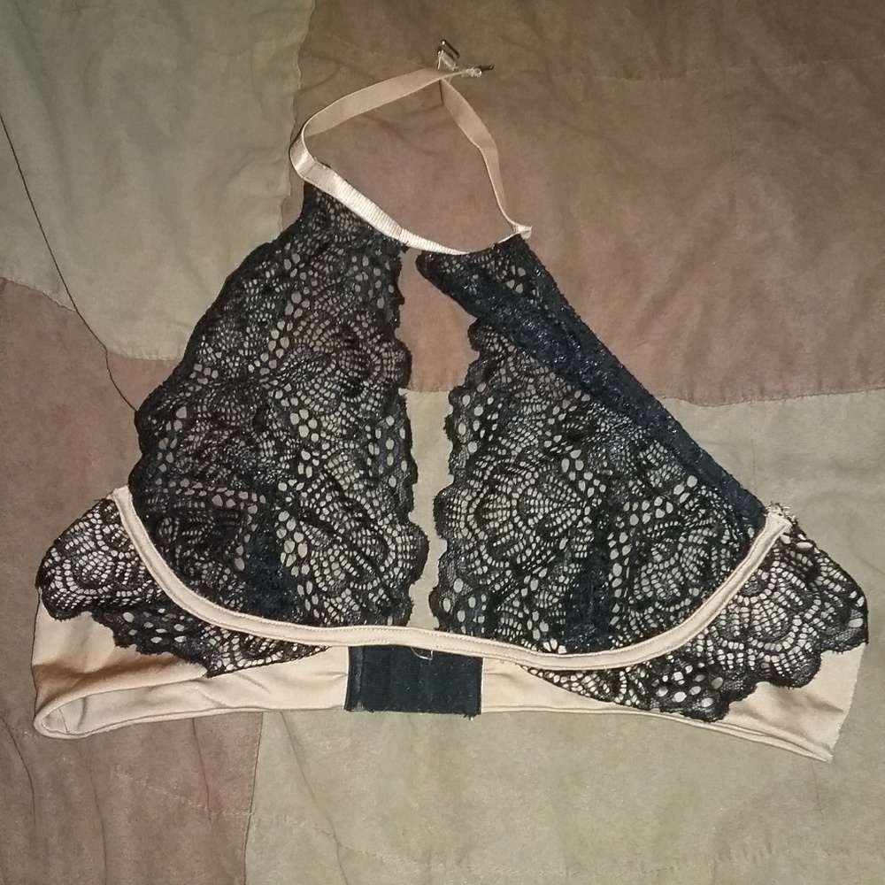 Tan and black lace bra